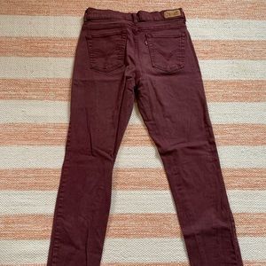 Levi’s 512 maroon/burgundy skinny jeans.